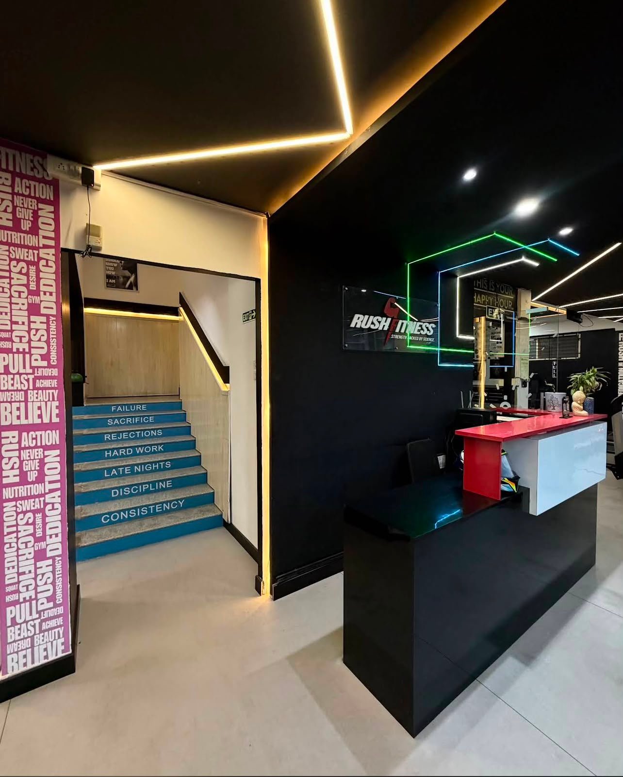 Rush Fitness VIP Reception Desk and Motivational Stairway